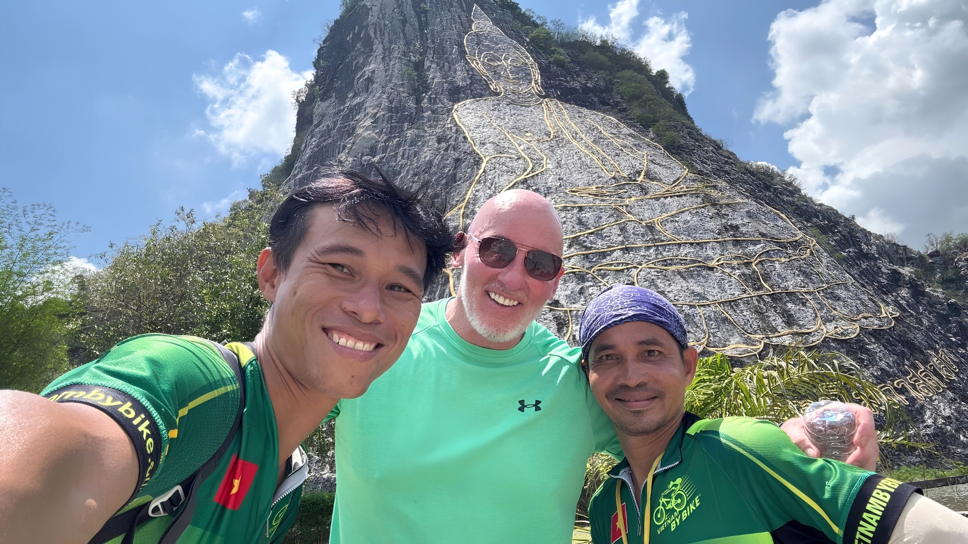 Danh Ngan (Mr. Leo) leading an international cycling expedition in Thailand