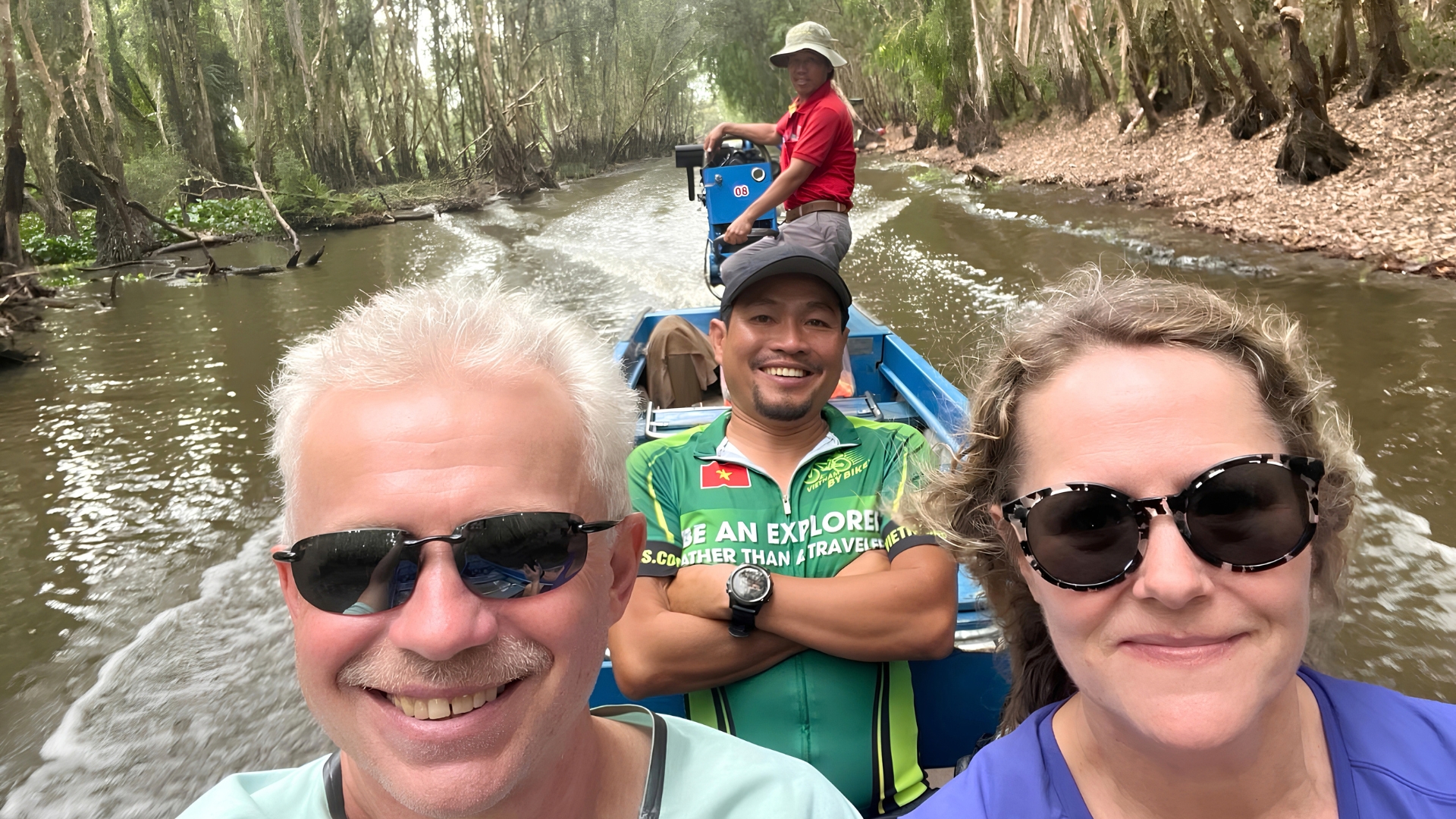 Lok Ly assisting cyclists on a Vietnam bicycle tour