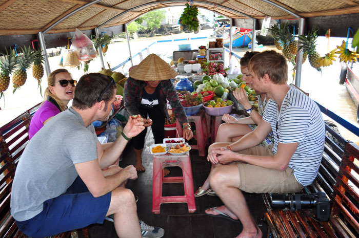 cai be floating market fruit boat - Best Mekong Delta Day Tour